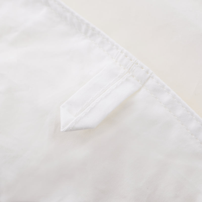 Hand-tied knot to keep the silk filling perfectly in place